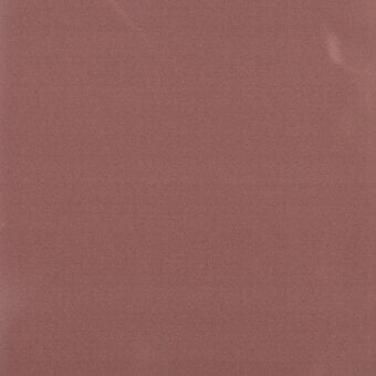Fabric swatch in muted reddish-brown with a tight weave texture, featuring a white label with “turri > fabric cat. x > 657 i” text.