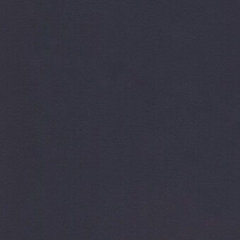 Turri leather texture, dark gray-purple, matte finish with subtle grain and partial label reading “turri > leather cat. lh > 1222p b”.