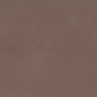 Turri leather swatch, warm brown taupe, matte granular texture with faint horizontal crease and imprinted code “1209p b”.