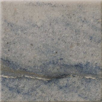 Turri marble tile, gray and blue stone, mottled texture with horizontal beige fracture line and matte finish.