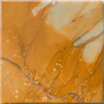 Giallo Siena marble sample, polished yellow stone, swirling veining pattern with white speckles and dark fissure lines, framed border.