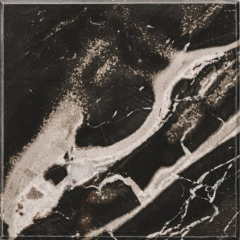 Black marble tile sample with white veining, displaying an organic mottled pattern and textured surface framed by a dark gray border.
