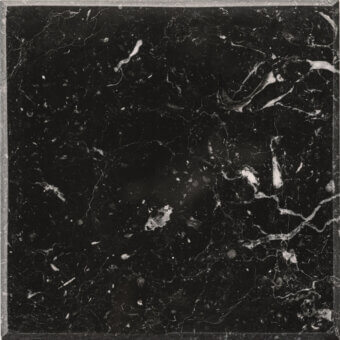 Black marble sample with white and gray veining, polished surface, organic swirling pattern, and rough edges, identified as 303m nero marquinia.