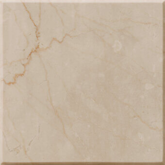Botticino marble sample with creamy beige and gold veining, polished surface, granular texture, and dark border framing.