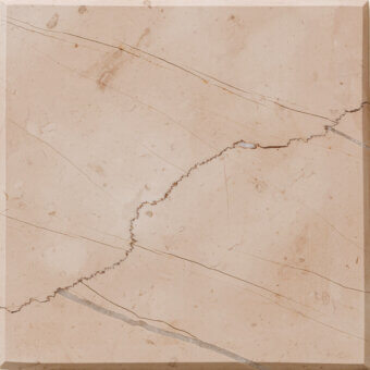 Rosa perlino marble sample with diagonal crack, light veins, polished finish, and dark border, showcasing natural stone variation.