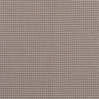 Vela ruggine rug, beige and rust square check pattern, dense woven textile with matte finish, studio product shot.
