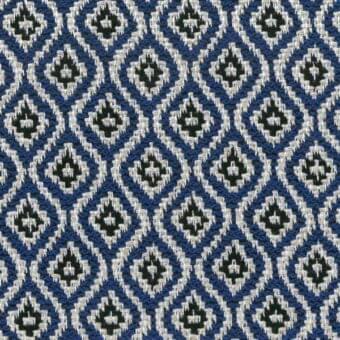 Geometric upholstery fabric with a repeating sapphire blue, off-white, and black diamond pattern in a dense, textured weave.