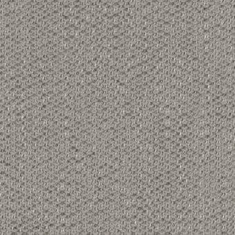 Woven fabric sample in silver-grey with a dense, grid-like texture and matte finish; label reads “varaschin lopez d122 silver”.