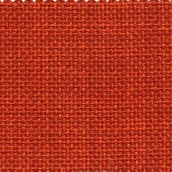 Terracotta orange fabric texture with a dense, regular weave and zig-zag stitched edges; identified as Varaschin Pop Soley E457 Poparagosta.