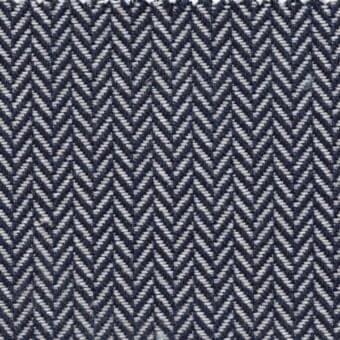 Herringbone fabric sample with navy blue and off-white threads, displaying a vertical, textured pattern and dense weave for upholstery.