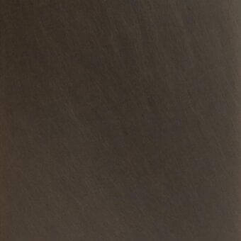 Burnished brass metal surface with diagonal linear striations, matte finish, and muted dark brown tone, displaying a textured, brushed appearance.