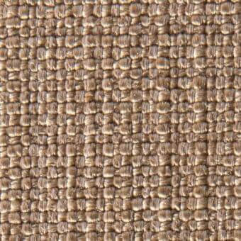 Jute fabric texture displaying a dense grid pattern in muted earthy brown tones, with visible horizontal and vertical threads and text label.