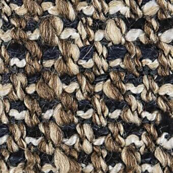 Woven tweed fabric with dark navy, beige, and brown mottled pattern; dense irregular weave with nubby yarn clusters and textural variations.