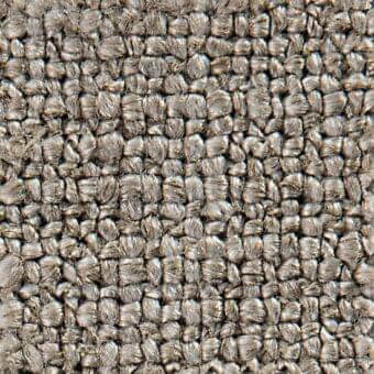 Woven fabric texture, muted gray color, dense looped pile construction with irregular grid pattern; “elbrus 19010” verzelloni sample.