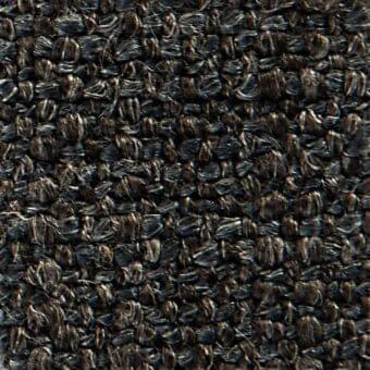 Dark gray woven fabric texture with a nubby, irregular pattern and granular surface; Elbrus 19015 verzelloni textile sample.