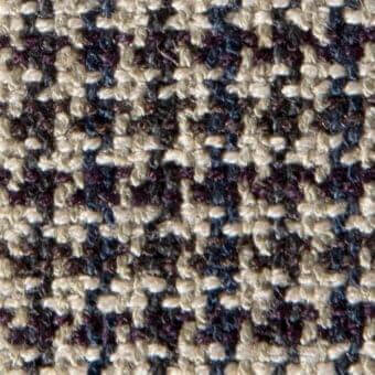 Glen plaid woven fabric, off-white, navy, and plum twill with a nubby texture and subtle sheen, exhibiting an irregular check pattern.