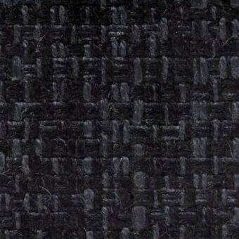 Charcoal gray woven fabric with slate blue threads, irregular texture, vertical and horizontal weave, “indo” 17023 verzelloni fabric sample.