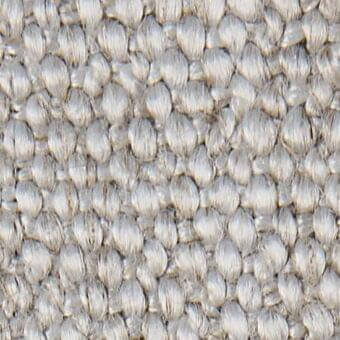 Light gray woven fabric texture, “Mila 20002” from verzelloni collection, features a nubby, three-dimensional, granular surface and complex weave.