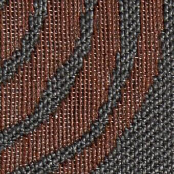 Woven fabric texture, dark gray and reddish-brown zigzag pattern, tight structured weave with diagonal text “verzelloni opi 20022”.