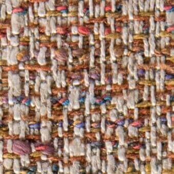 Woven tweed fabric texture, muted gray with brown, gold, red & blue threads, nubby bouclé weave, durable construction for upholstery.