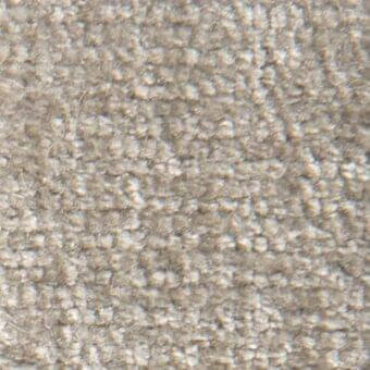 Granulated texture sample, neutral gray and beige tones, irregular particle composition, matte finish, non-reflective surface, subtle tonal variations.