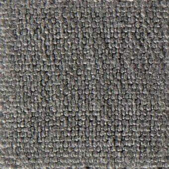 Dark gray woven fabric texture with granular surface, rectilinear weave, and embedded circular elements; verzelloni romeo 13056 textile sample.