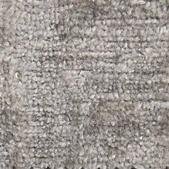 Woven fabric texture, muted gray color, dense looped pile with horizontal ridges, matte finish, substantial weight, handcrafted quality.