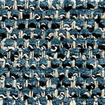 Teal tweed fabric texture with off-white warp and weft, exhibiting a nubby weave and subtle sheen, suggesting durability for upholstery.