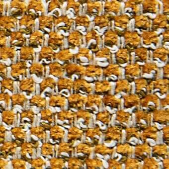 Woven fabric texture, golden yellow and olive green, irregular dense pattern with looped and defined strands, substantial weight and tactile quality.
