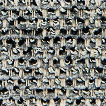 Gray twill fabric texture with speckled weave, diagonal ribbing, and matte finish; manufacturer detail “verzelloni allen 22006” visible.