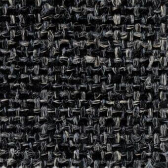 Charcoal gray tweed fabric texture with irregular weave, light gray and off-white threads, dense construction, and nubby surface.