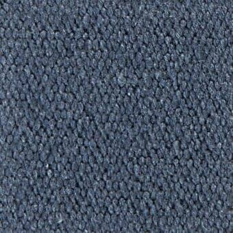 Woven fabric texture in blue-gray with a dense, nubby surface and matte finish; displays tonal variations and fiber pattern.