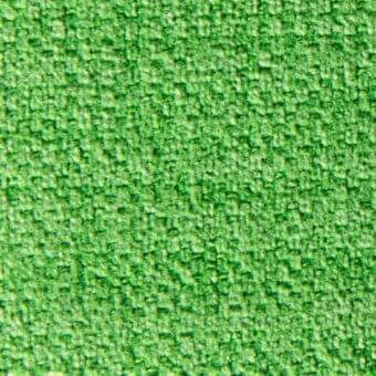 Granular green texture with uneven surface composed of small, irregular elements; saturated bright color with subtle tonal variations.