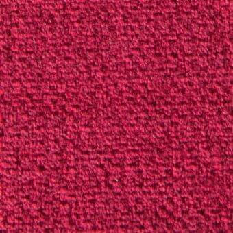 Red woven fabric texture with a nubby, irregular surface and consistent deep color, displaying subtle tonal variations from light and shadow.