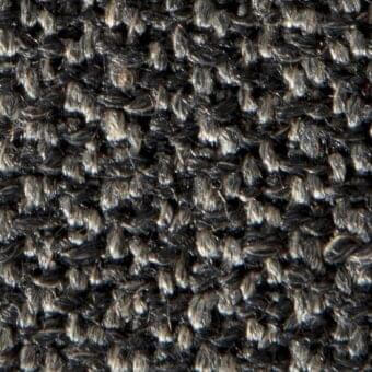 Dark charcoal gray tweed fabric texture with variegated weave, matte finish, and visible red “klimt 14057” textile code woven within.
