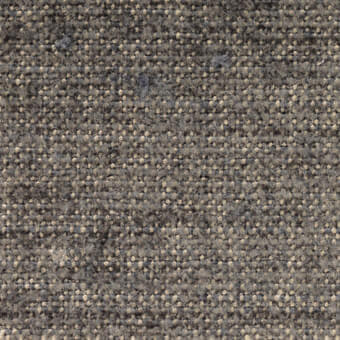 Woven fabric texture, muted gray tweed with heathered beige and charcoal tones, dense grid pattern with subtle knots, verzelloni lena 17030.