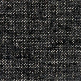 Charcoal gray fabric sample with speckled texture, featuring beige tufts and a nubby weave; Verzelloni “Lena 17032” label visible.