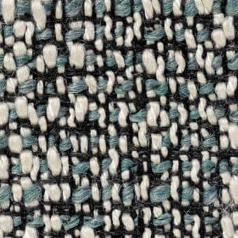 Woven fabric texture, off-white, black, teal-blue, irregular speckled pattern, thick and thin yarns, verzelloni zambesi 17013 label.