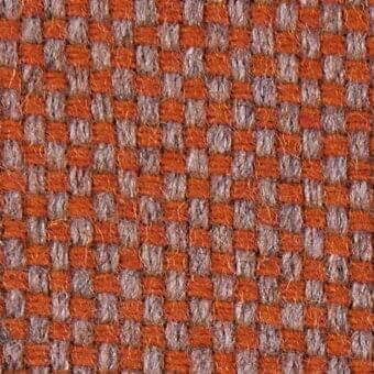 Woven fabric texture with repeating square pattern in muted orange and soft gray, featuring a tight matte weave and slightly raised surface.
