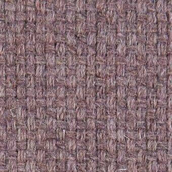 Woven fabric texture in muted plum, dense irregular plain weave with visible fibers and a nubby surface; verzelloni argali 18035 label present.