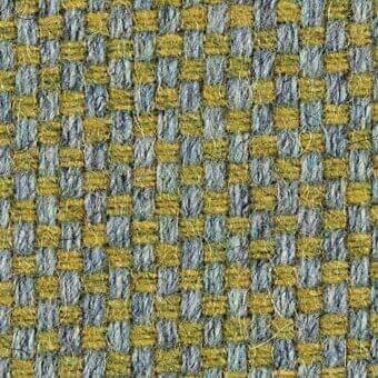 Woven fabric texture with grid pattern in muted mustard yellow and gray-blue tones, featuring a slightly raised, nubby surface.