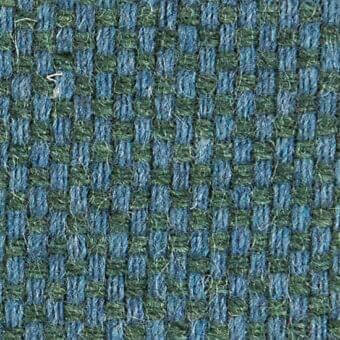 Woven fabric texture with teal and olive grid pattern, dense looped yarns, subtle geometric design, natural fiber appearance.