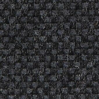 Dark charcoal gray woven fabric texture with heathered effect, dense nubby surface, and repeating square weave pattern; verzelloni argali 18044.