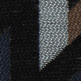 Verzelloni fabric swatch displaying a vertically ridged pattern in black, brown, and silver-grey, labeled “Atena 20023” with textured granular areas.
