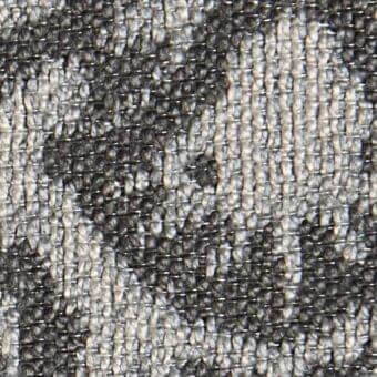 Woven gray fabric texture displaying a basket weave pattern, subtle mottling, and integrated “verzelloni deva 20009” text.
