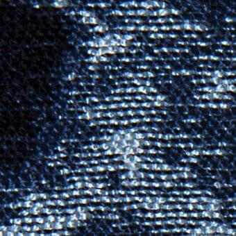 Dark blue woven fabric texture displaying a diagonal rib pattern, heathered tone, and matte finish with integrated “verzelloni deva 20013” text.