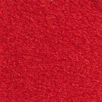 Red fabric swatch with dense, nubby texture and tonal variations, displaying a woven surface and even studio lighting.
