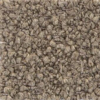 Woven fabric texture, brown and grey tones, dense nubby surface with grid-like structure; verzelloni fuji 19030 textile sample.