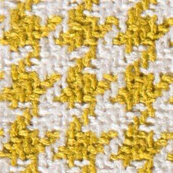Floral embroidered fabric, beige woven ground with golden-yellow blooms in a repeating grid pattern, textured and tactile appearance.