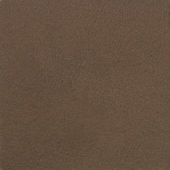 Matte brown texture displaying a granular surface, uniform earthy tone, and slight tonal variations suggesting a dense, porous organic material.